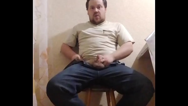 A fat gay man sat down on a chair to masturbate his little cock