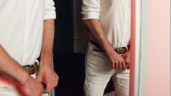 A handsome guy masturbates in front of a mirror. I finish loudly and fill the mirror with my sperm.