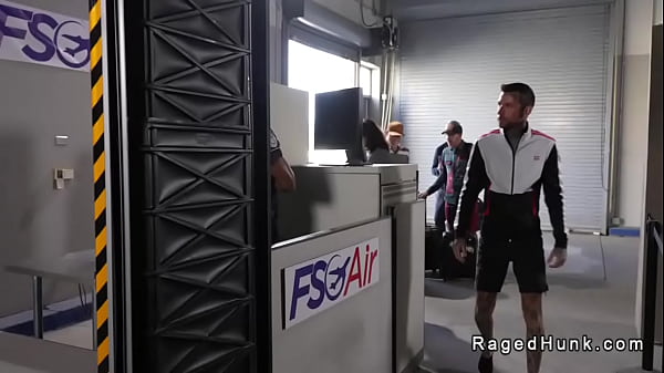 Airport agent research ass of passenger into a back room