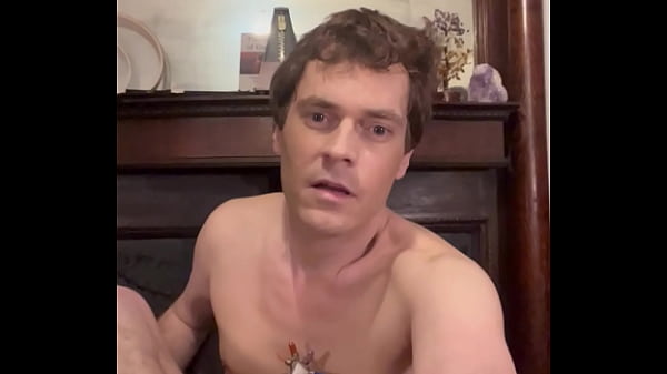 Daniel sticks his foot at the camera and shakes his bells