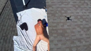 Drone caught naked male outdoors on roof jerking off nudist painting public