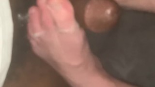 My soft white feet milking the cum from black cock
